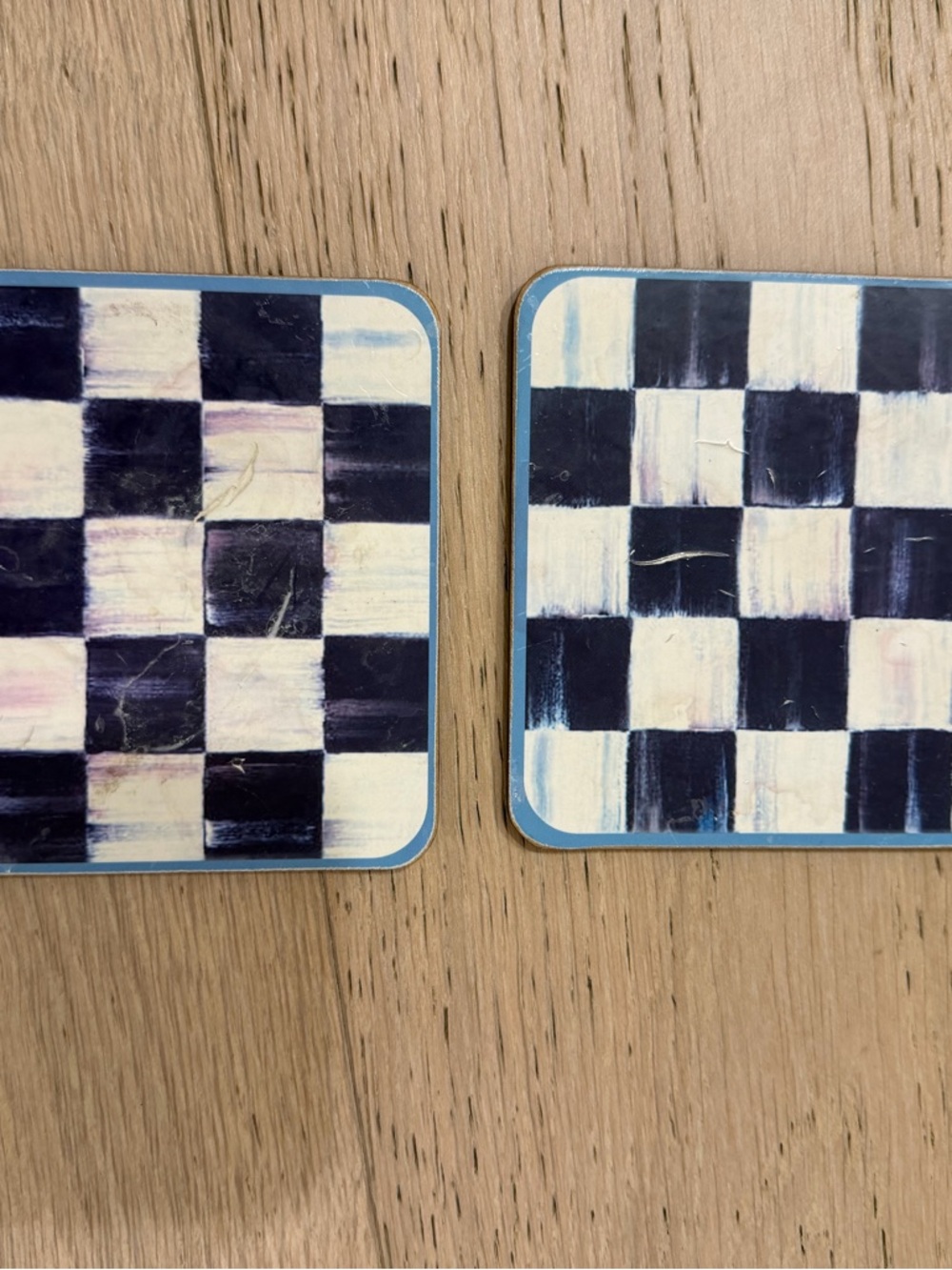 MacKenzie-Childs Black and White Checkered Coasters with Blue Trim